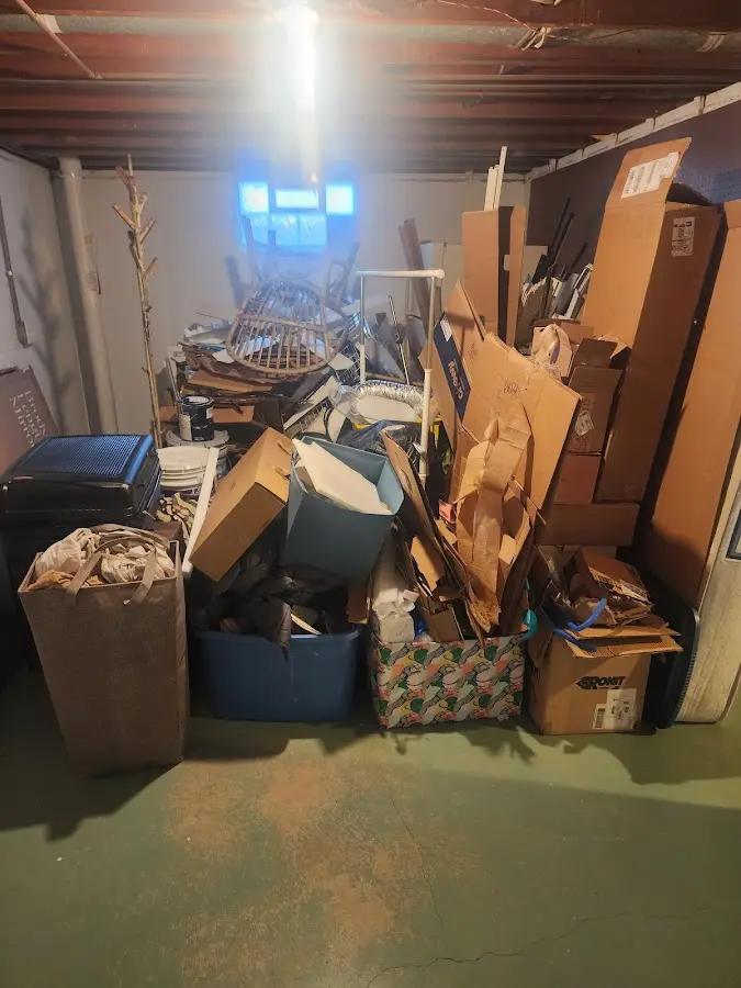 Roll-off dumpster container at job site for 2 Yard Dumpster Rental in West Pleasant View